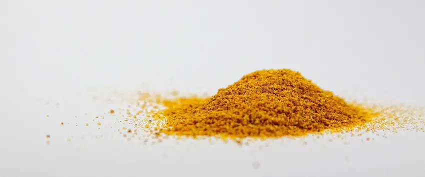 turmeric powder on white surface